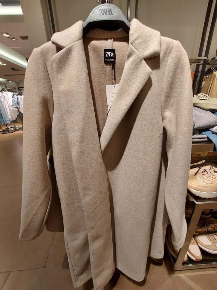 the winter coat in baby blue colors : baby blue - beige - black